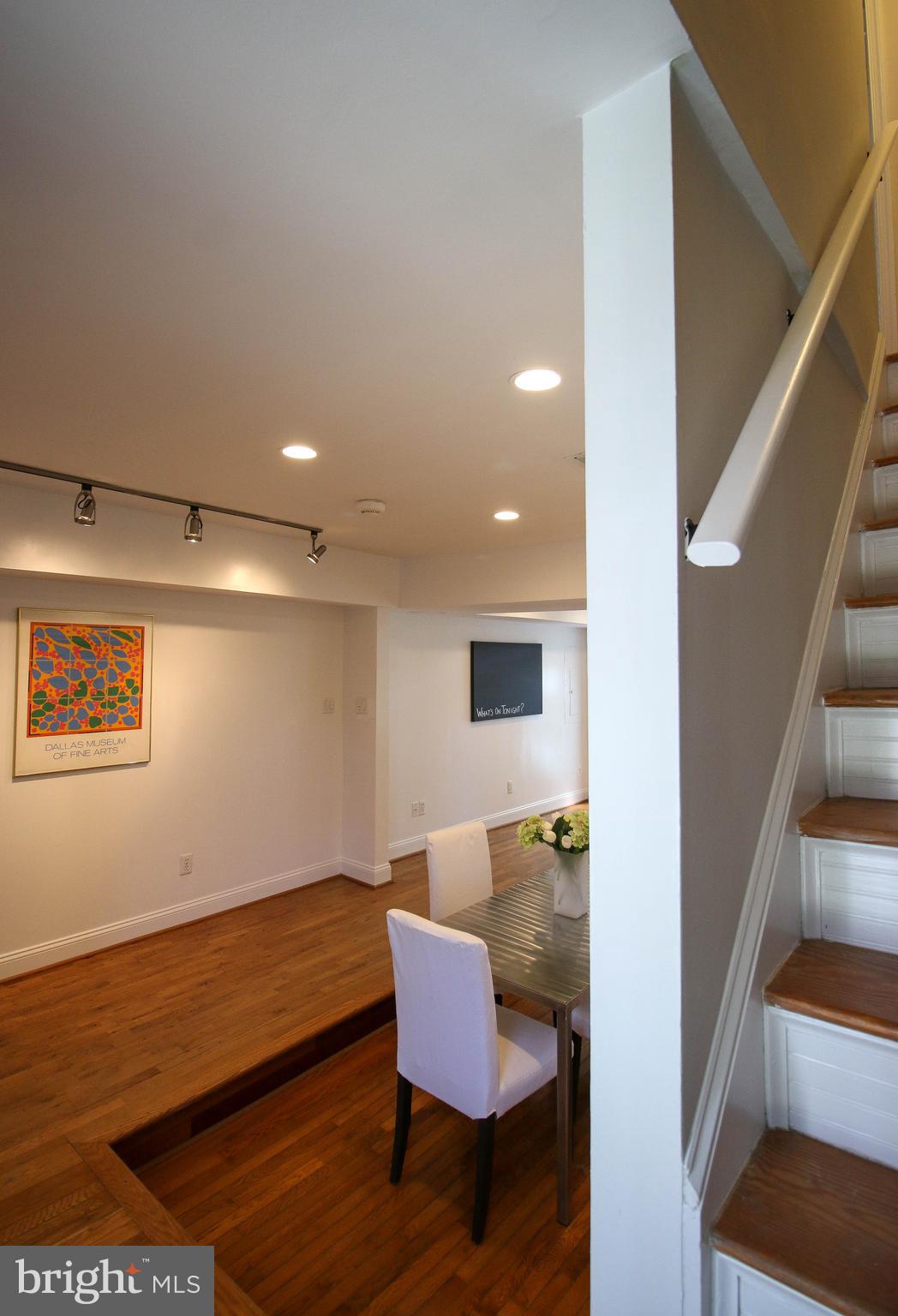 103 17th Street Southeast Washington, DC 20003 - Photo 14 of 26 a room with furniture and stairs