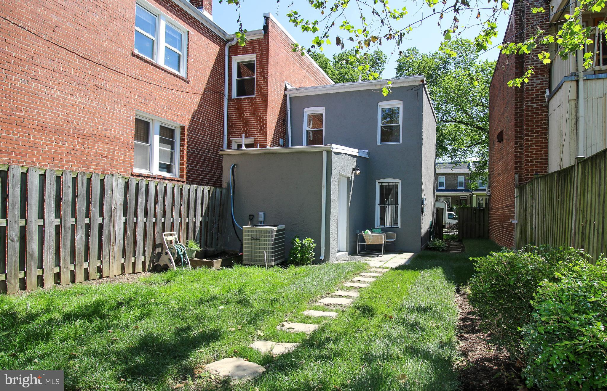 103 17th Street Southeast Washington, DC 20003 - Photo 25 of 26 a backyard of a house with lots of green space