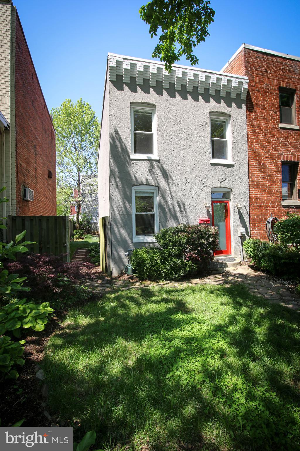 103 17th Street Southeast Washington, DC 20003 - Photo 26 of 26 a front view of a house with a yard