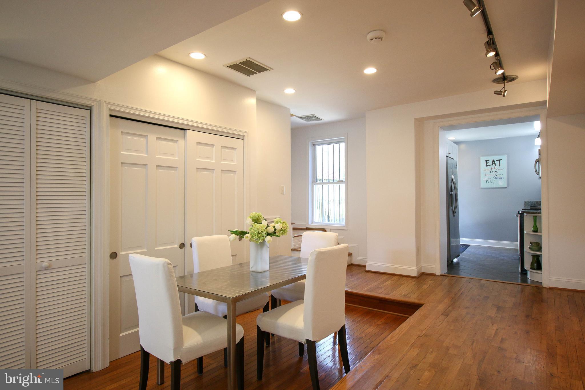 103 17th Street Southeast Washington, DC 20003 - Photo 9 of 26 a view of a dining room with furniture and wooden floor