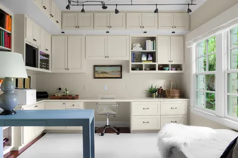 a kitchen with a cabinets and window
