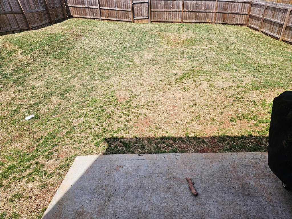 902 Ashwood Lane Easley, SC 29640 - Photo 4 of 39 A fully fenced yard offers a private outdoor retreat with ample space for activities.