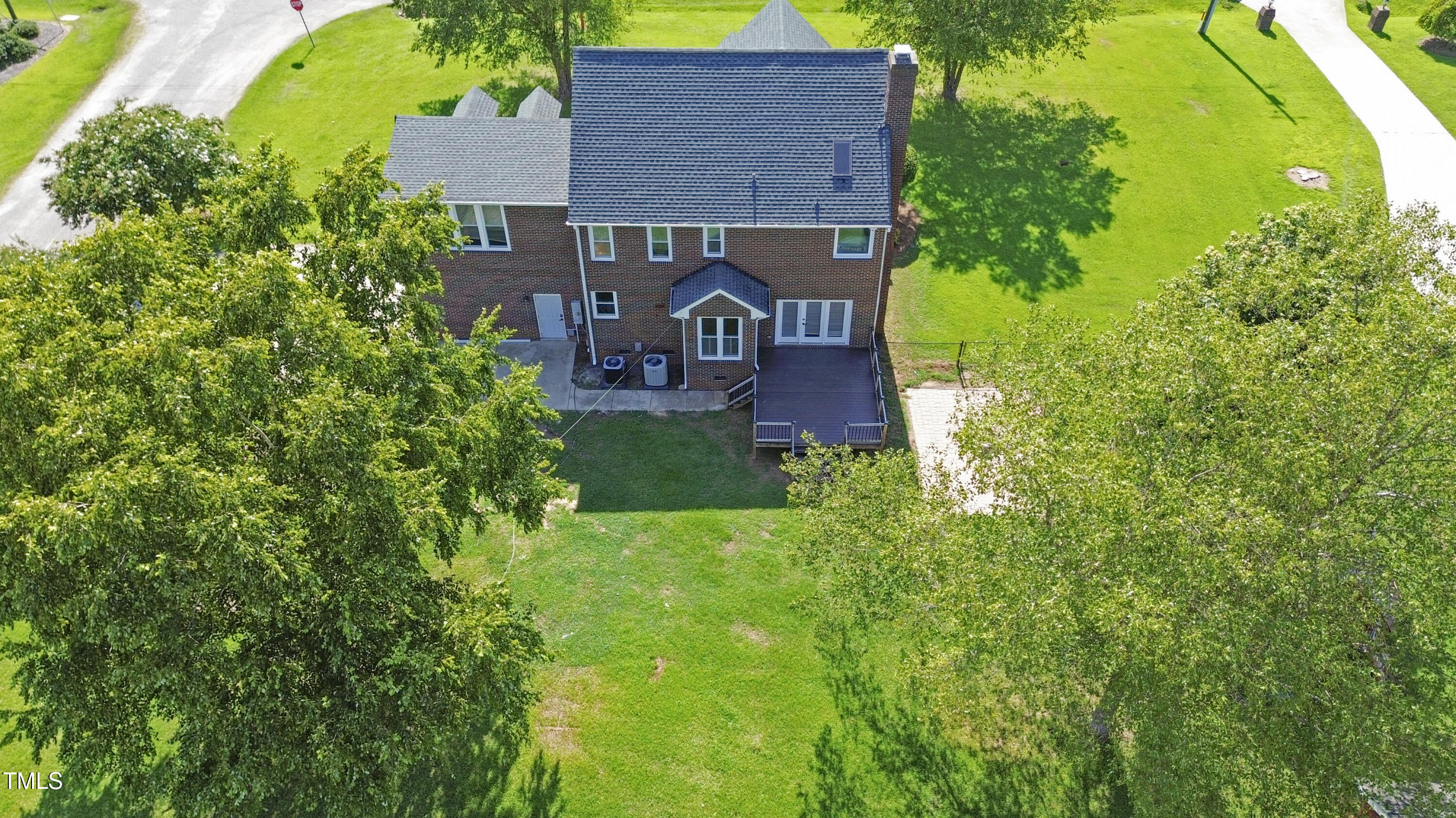 1010 Warren Road Erwin, NC 28339 - Photo 12 of 54 aerial view of a house with a yard