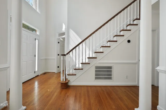 a view of entryway with wooden floor