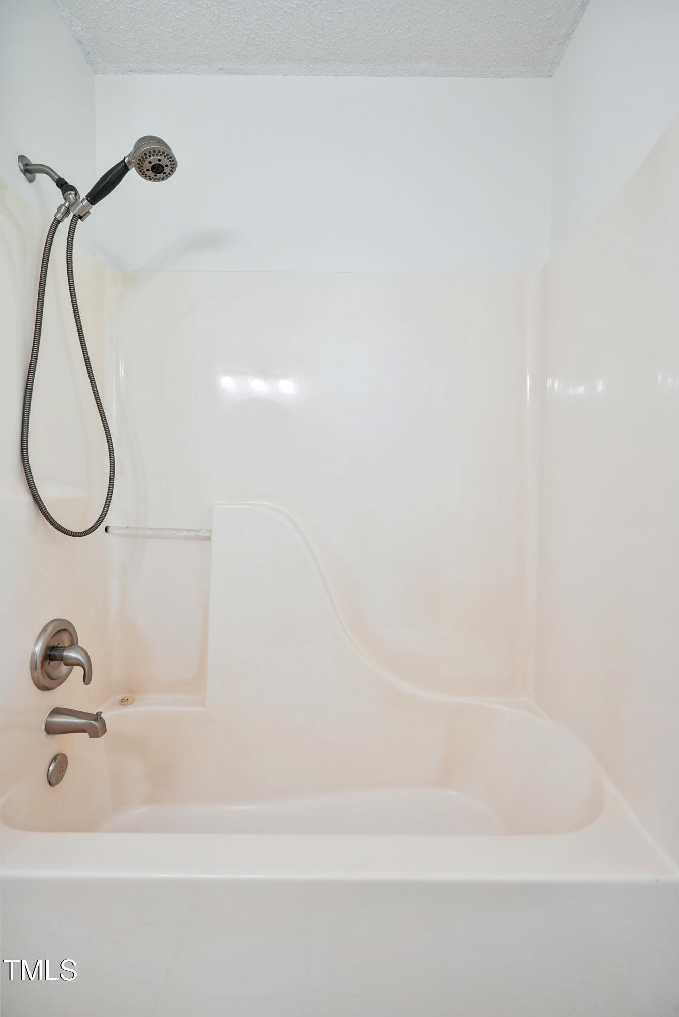 1010 Warren Road Erwin, NC 28339 - Photo 38 of 54 a bathroom with a bath tub and a shower