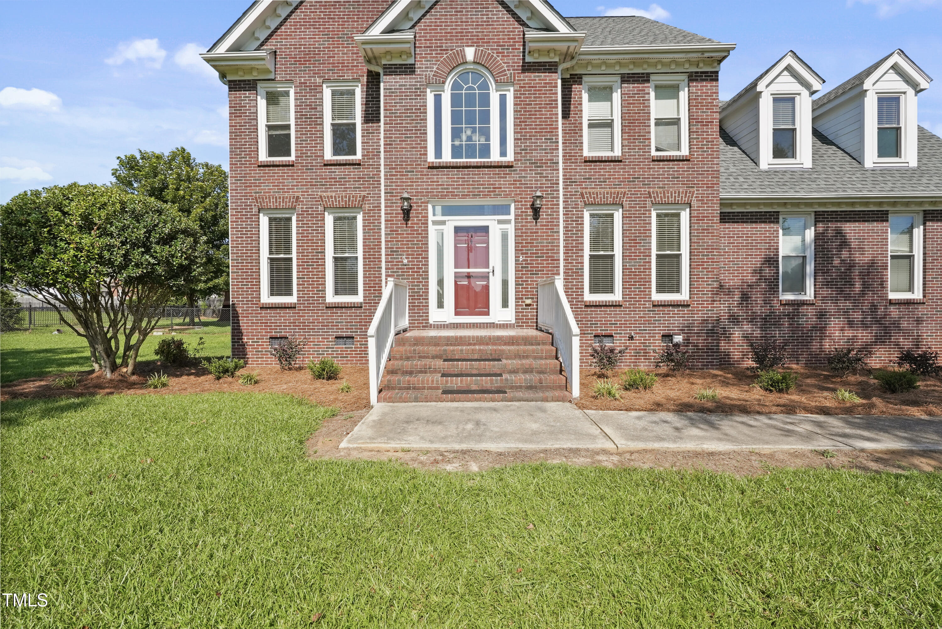 1010 Warren Road Erwin, NC 28339 - Photo 4 of 54 a front view of a house with yard
