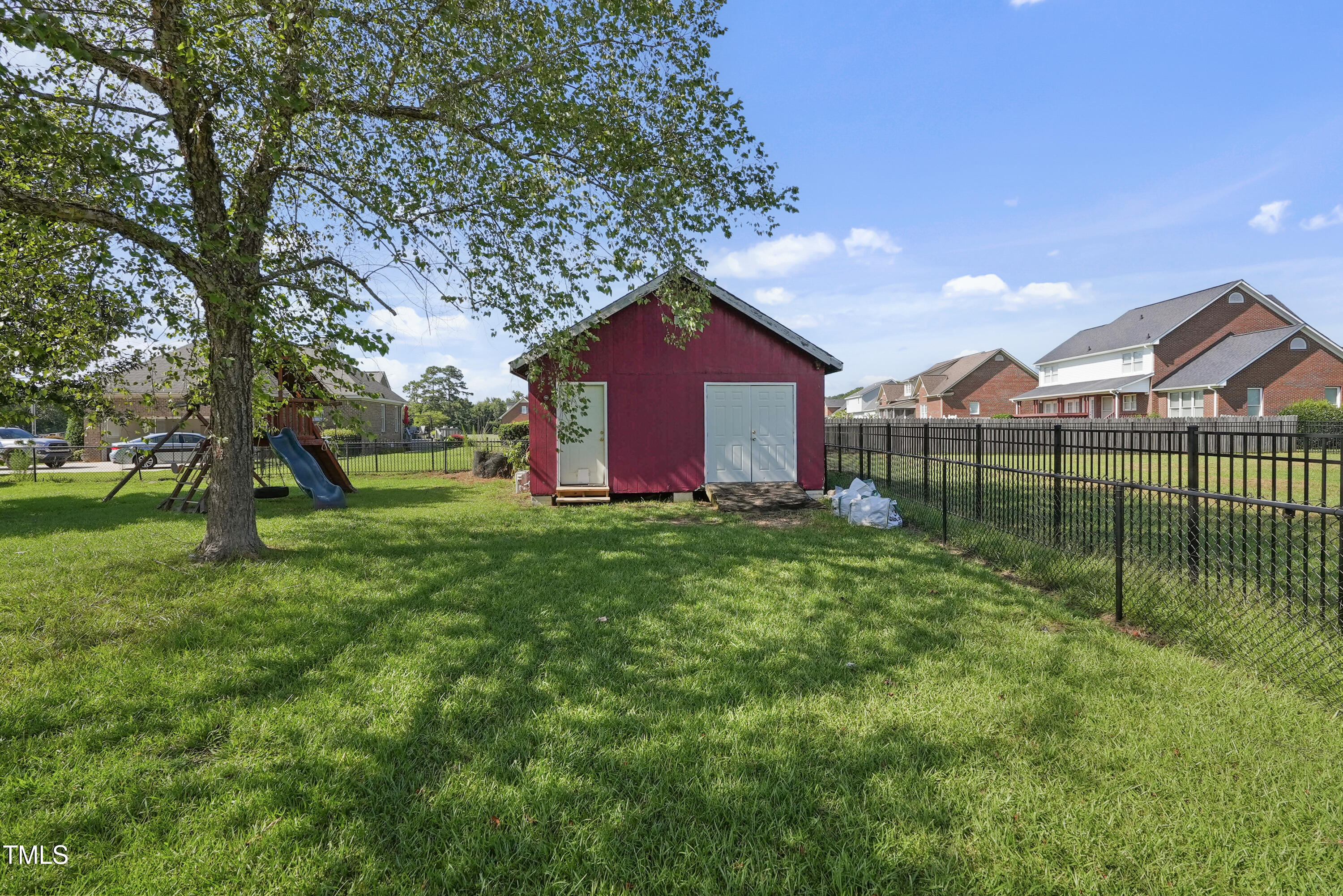 1010 Warren Road Erwin, NC 28339 - Photo 53 of 54 a front view of a house with garden