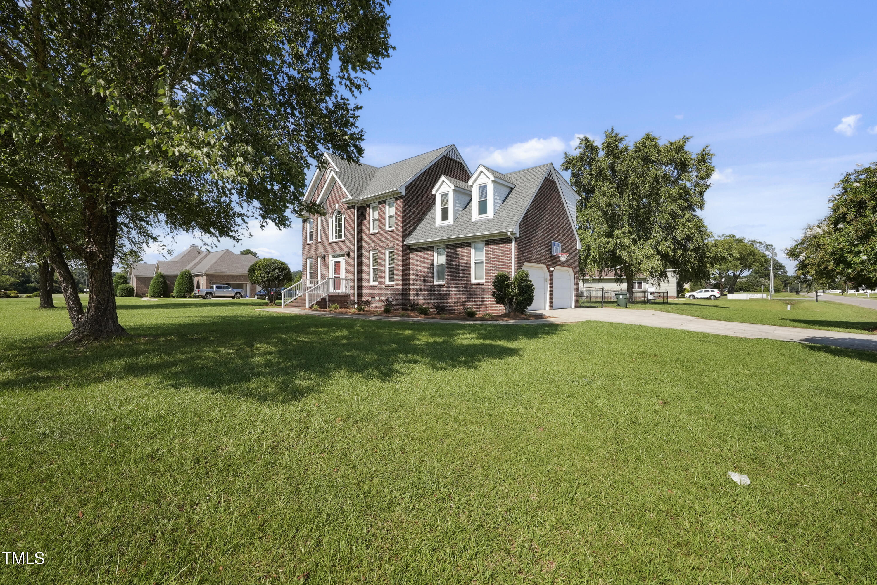 1010 Warren Road Erwin, NC 28339 - Photo 10 of 54 a front view of house with yard and green space
