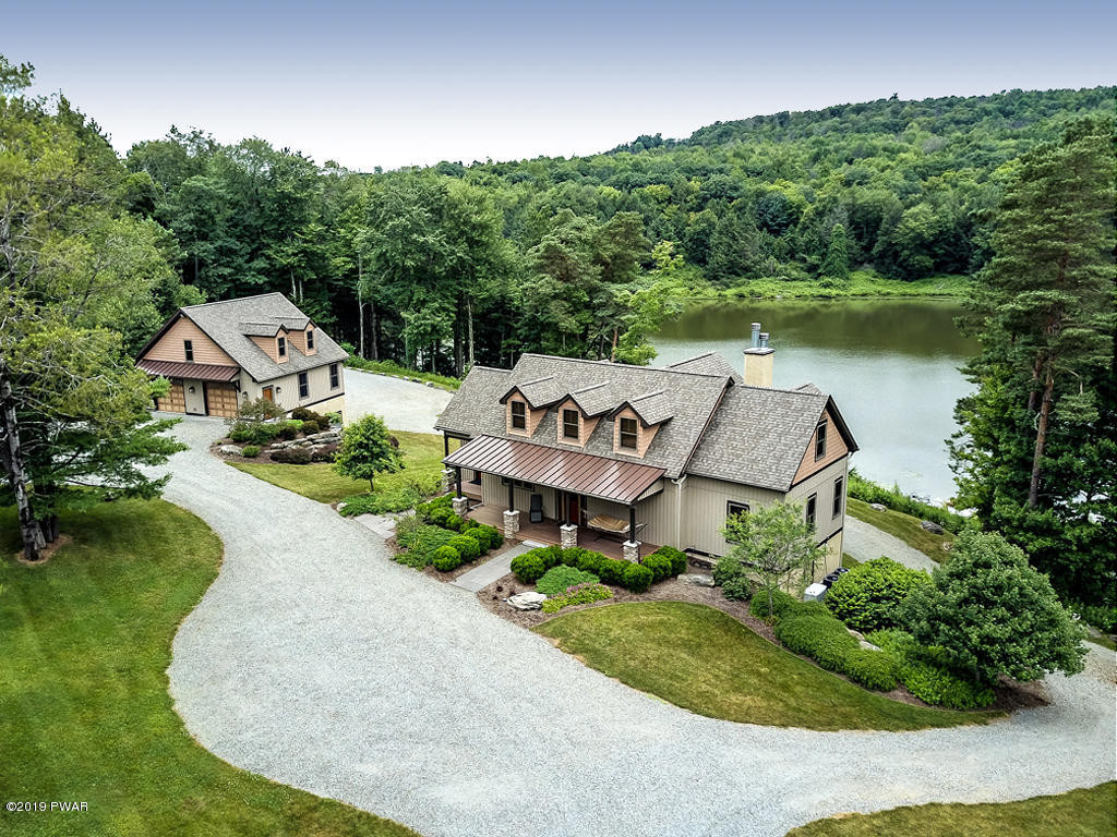 419 Bare Valley Road Montrose, PA 18801 - Photo 1 of 72 an aerial view of a house with garden space and street view