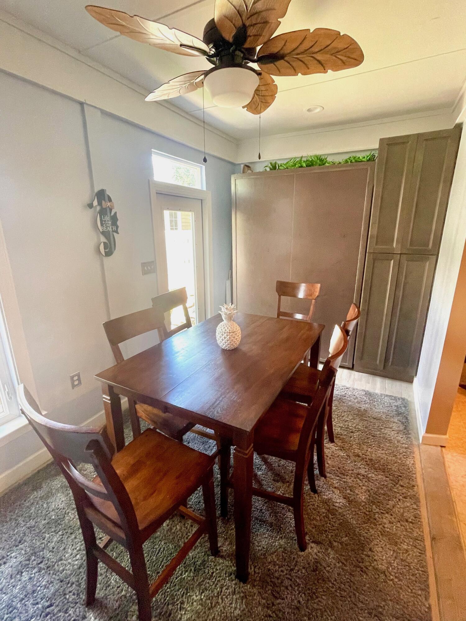 184 South Zander Way Santa Rosa Beach, FL 32459 - Photo 12 of 36 a view of a dining room with furniture