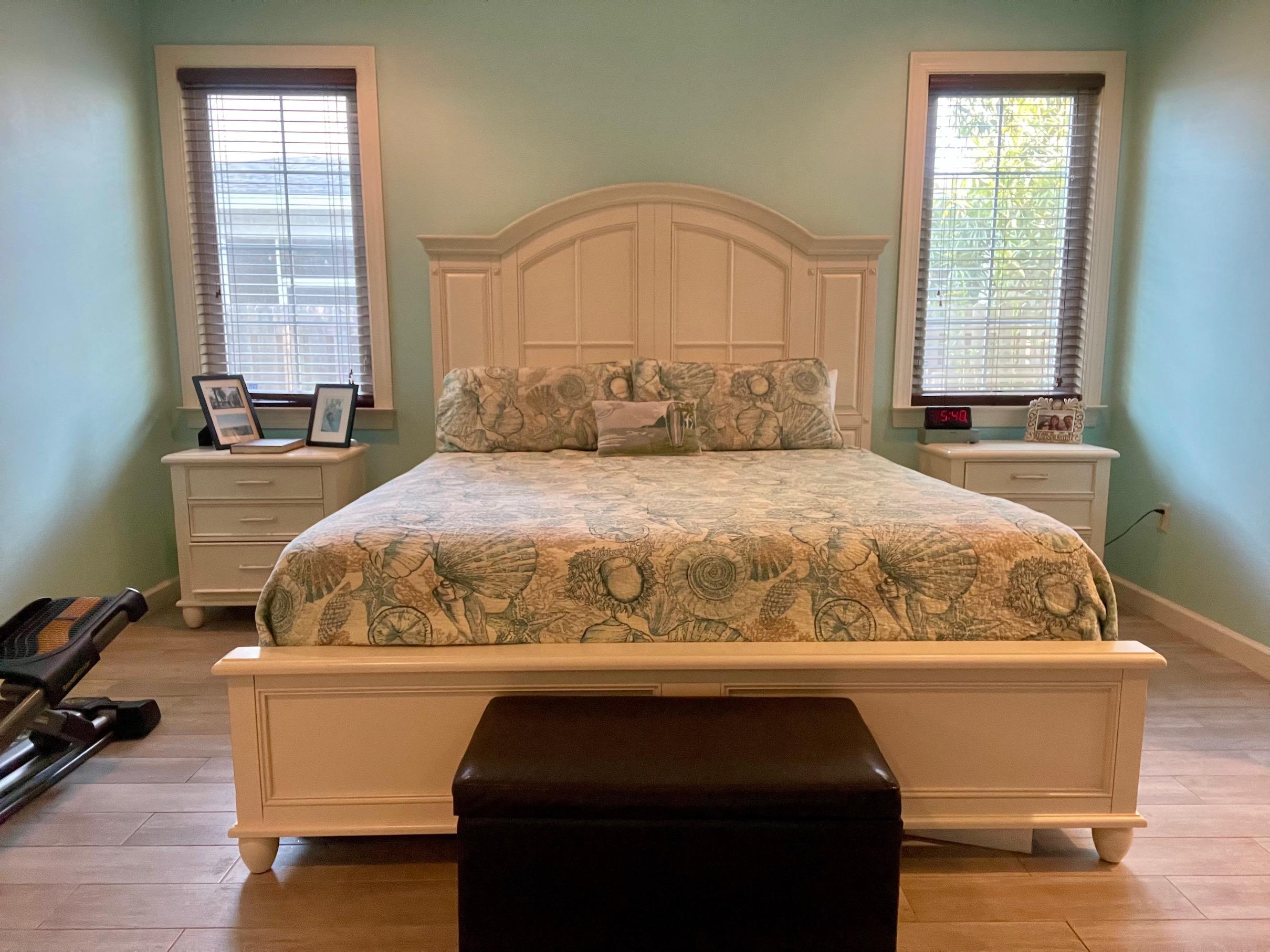 184 South Zander Way Santa Rosa Beach, FL 32459 - Photo 14 of 36 a bedroom with a bed and a window