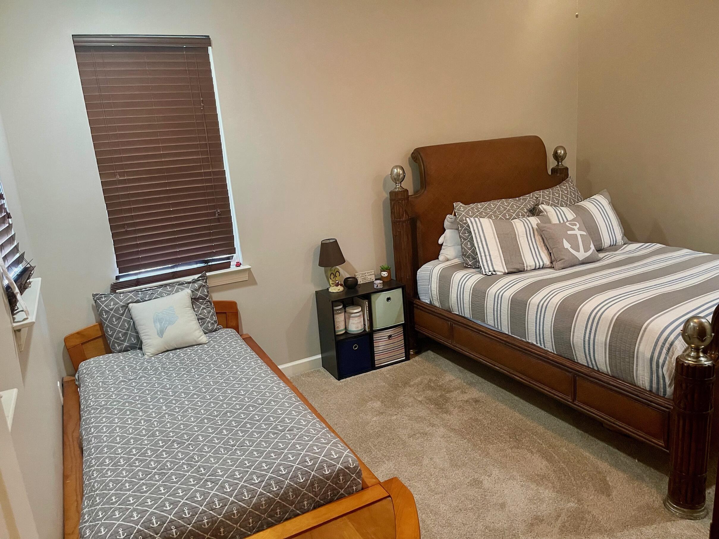 184 South Zander Way Santa Rosa Beach, FL 32459 - Photo 21 of 36 a bedroom with bed and window