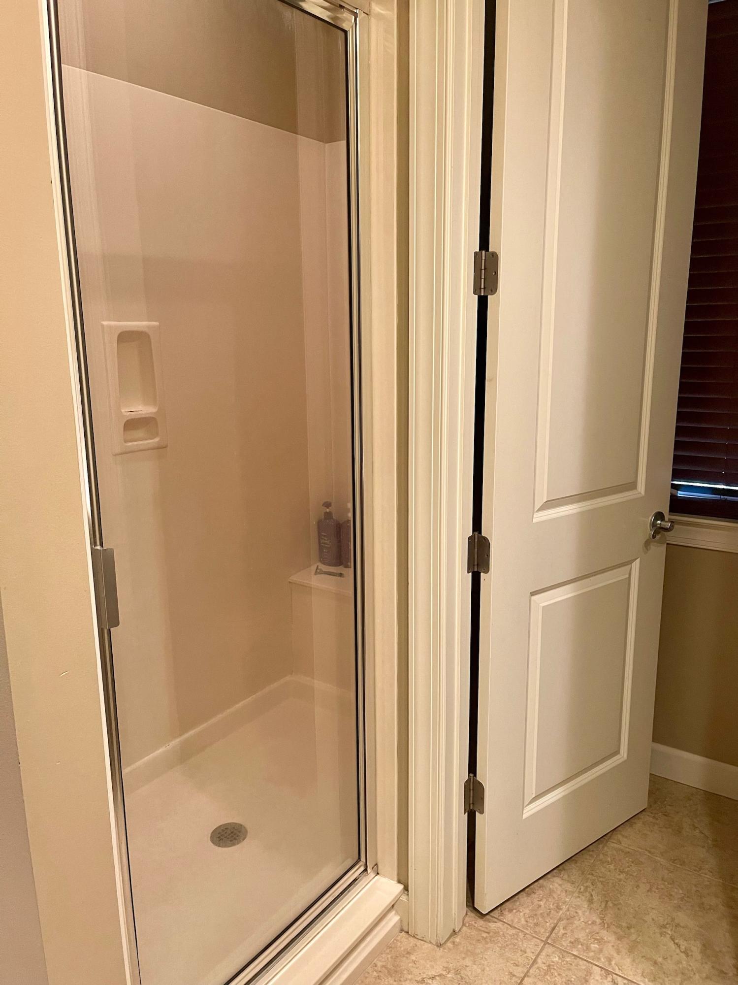 184 South Zander Way Santa Rosa Beach, FL 32459 - Photo 33 of 36 a bathroom with a glass door shower