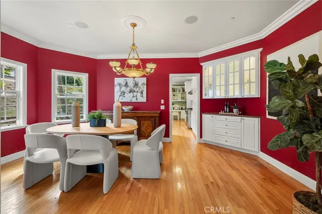 a kitchen with stainless steel appliances granite countertop a stove and a refrigerator