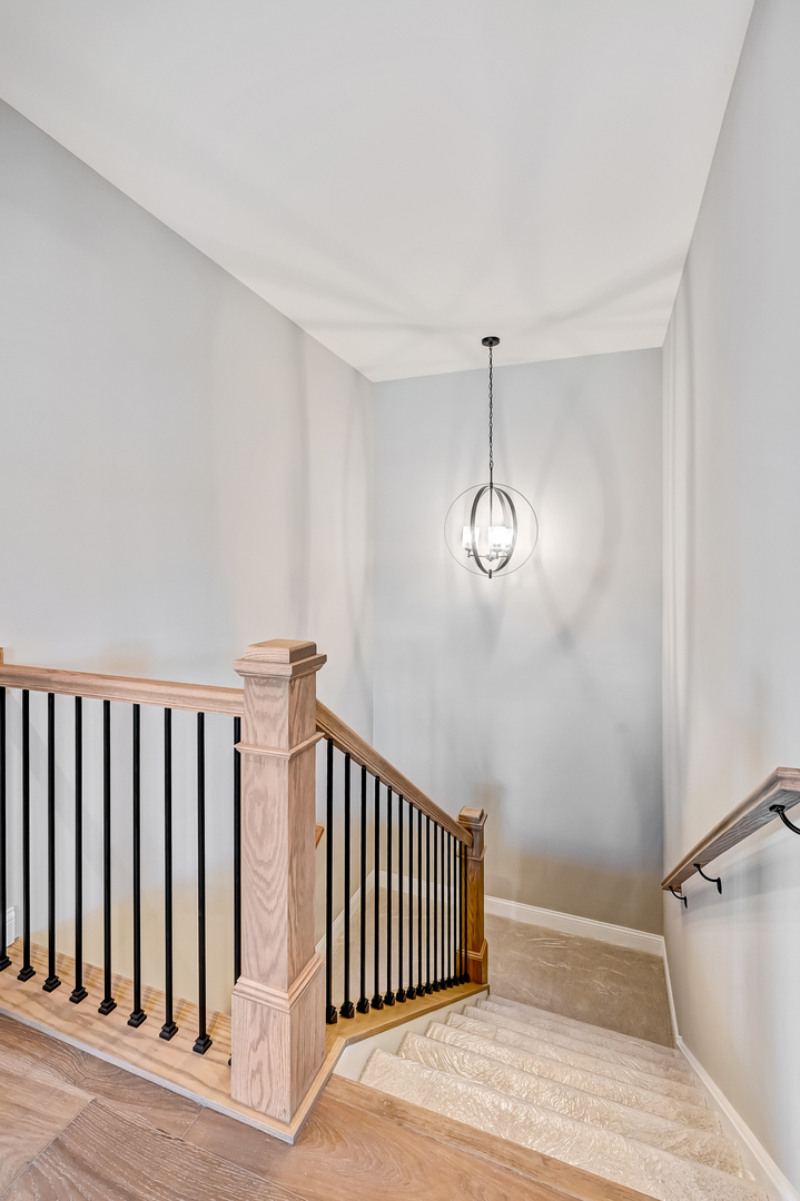 12235 Copper Ridge Drive, Unit 18 Lemont, IL 60439 - Photo 25 of 30 a view of a hallway with entryway