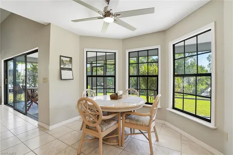 a kitchen with stainless steel appliances granite countertop a stove oven and a refrigerator