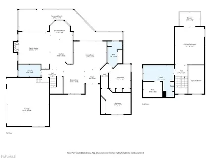 an aerial view of a house with garden space and lake view