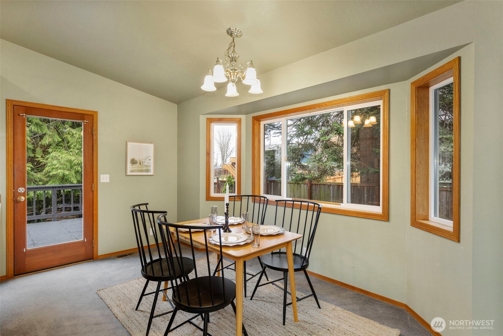 26388 Ansell Road Northwest Poulsbo, WA 98370 - Photo 11 of 37 a view of a dining room with furniture window and outside view