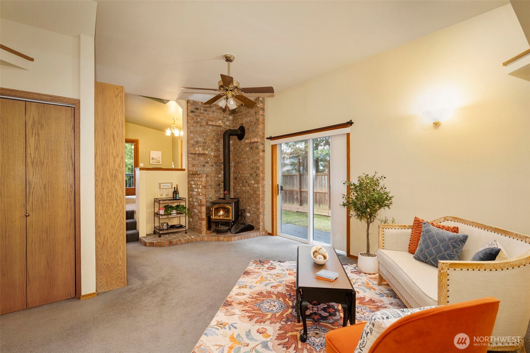 26388 Ansell Road Northwest Poulsbo, WA 98370 - Photo 14 of 37 a living room with furniture and a chandelier