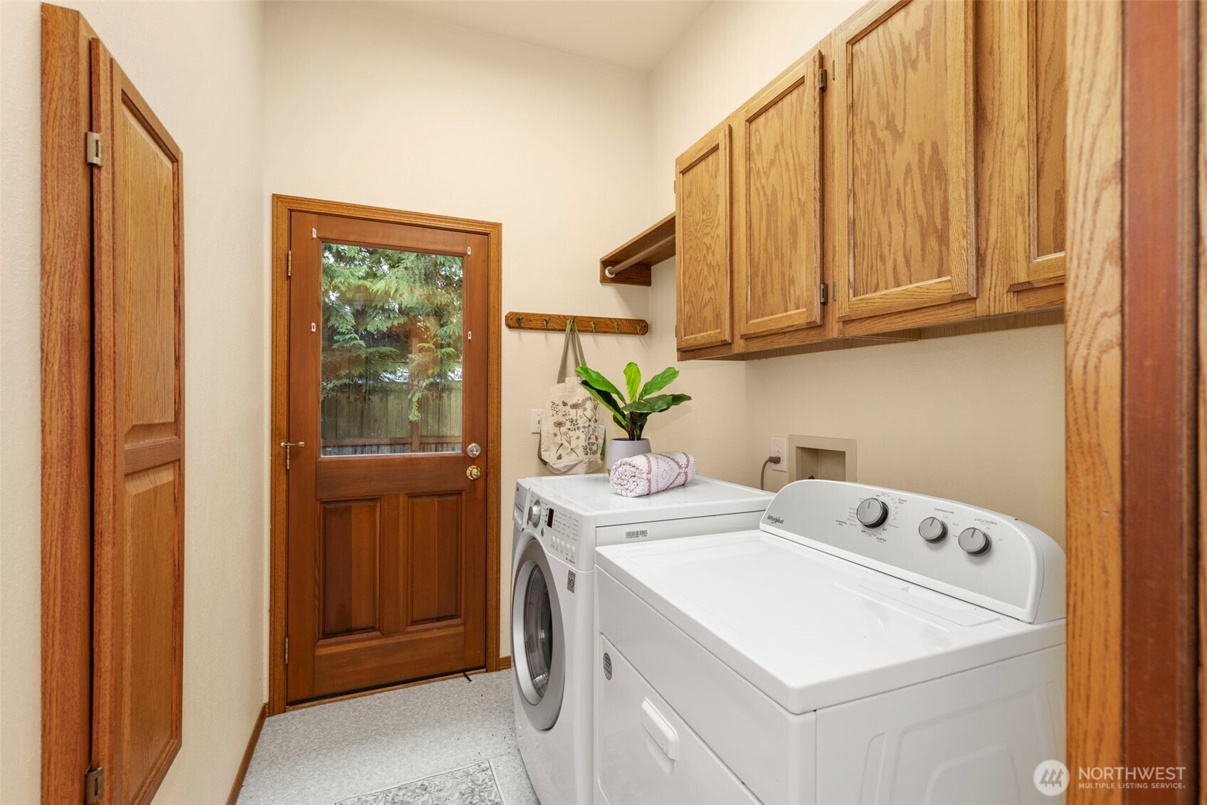 26388 Ansell Road Northwest Poulsbo, WA 98370 - Photo 16 of 37 a utility room with dryer and washer