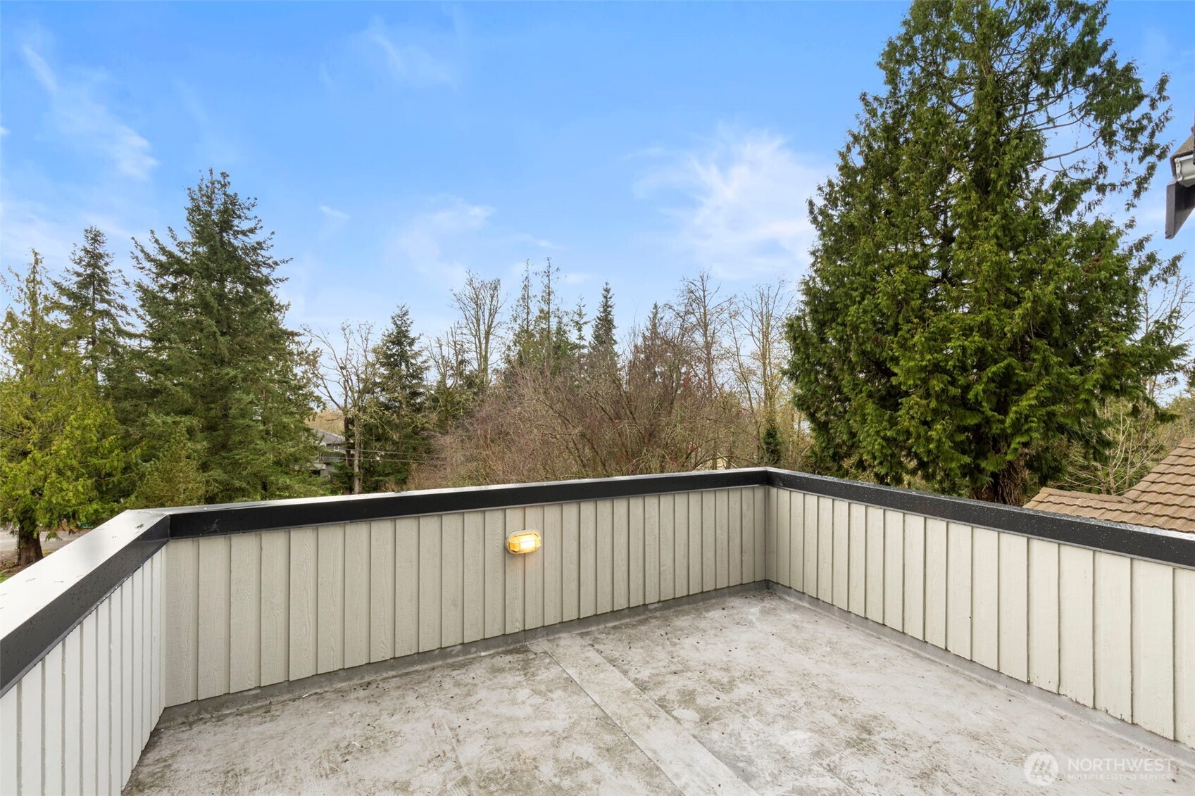 26388 Ansell Road Northwest Poulsbo, WA 98370 - Photo 21 of 37 a view of a balcony with trees