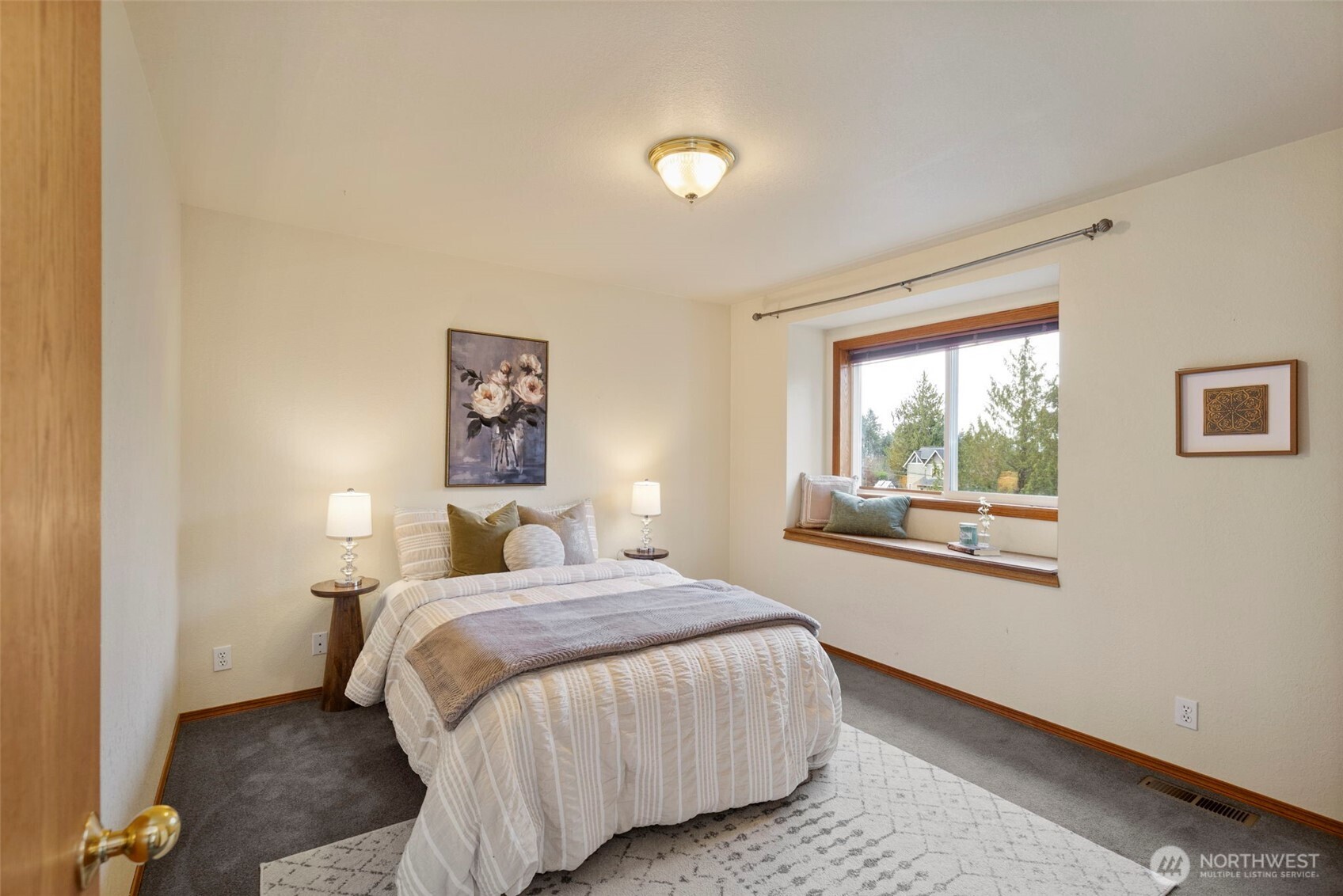 26388 Ansell Road Northwest Poulsbo, WA 98370 - Photo 22 of 37 a bedroom with a bed and a window