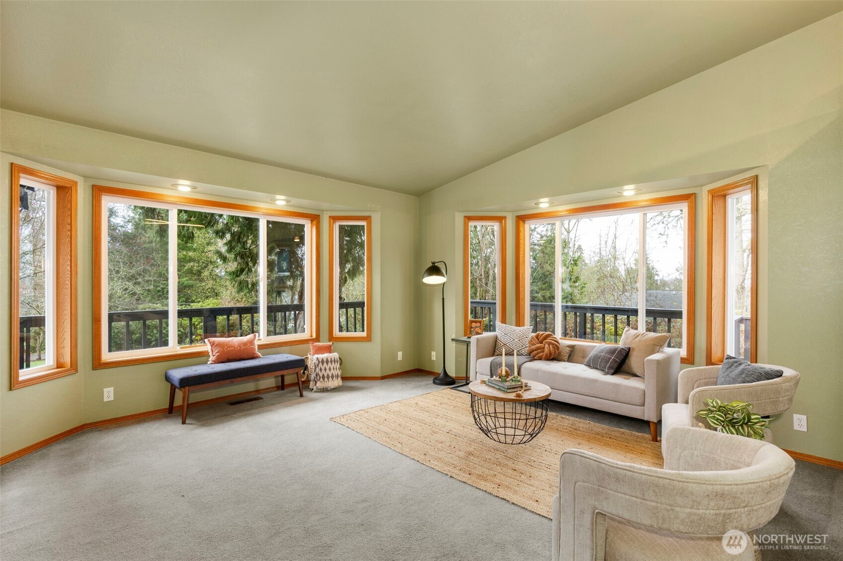 26388 Ansell Road Northwest Poulsbo, WA 98370 - Photo 5 of 37 a living room with furniture and a large window