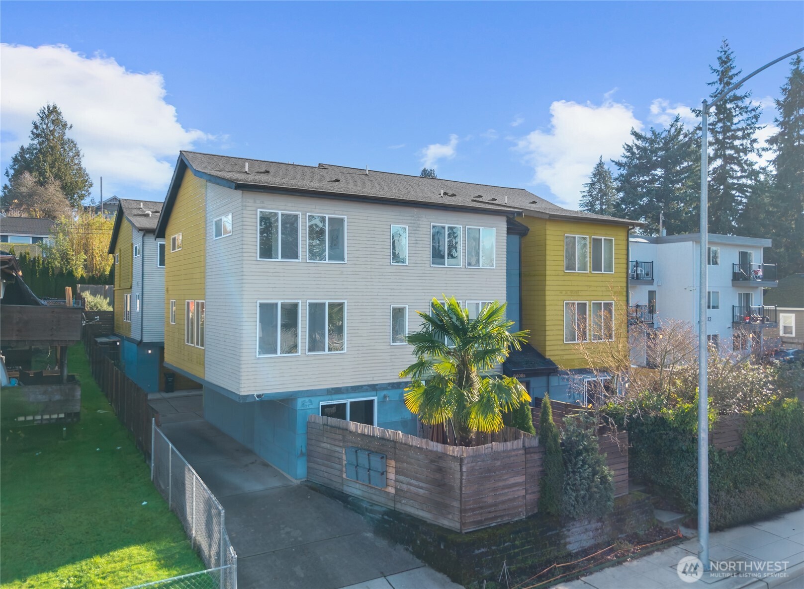 a front view of house with yard outdoor seating and barbeque oven
