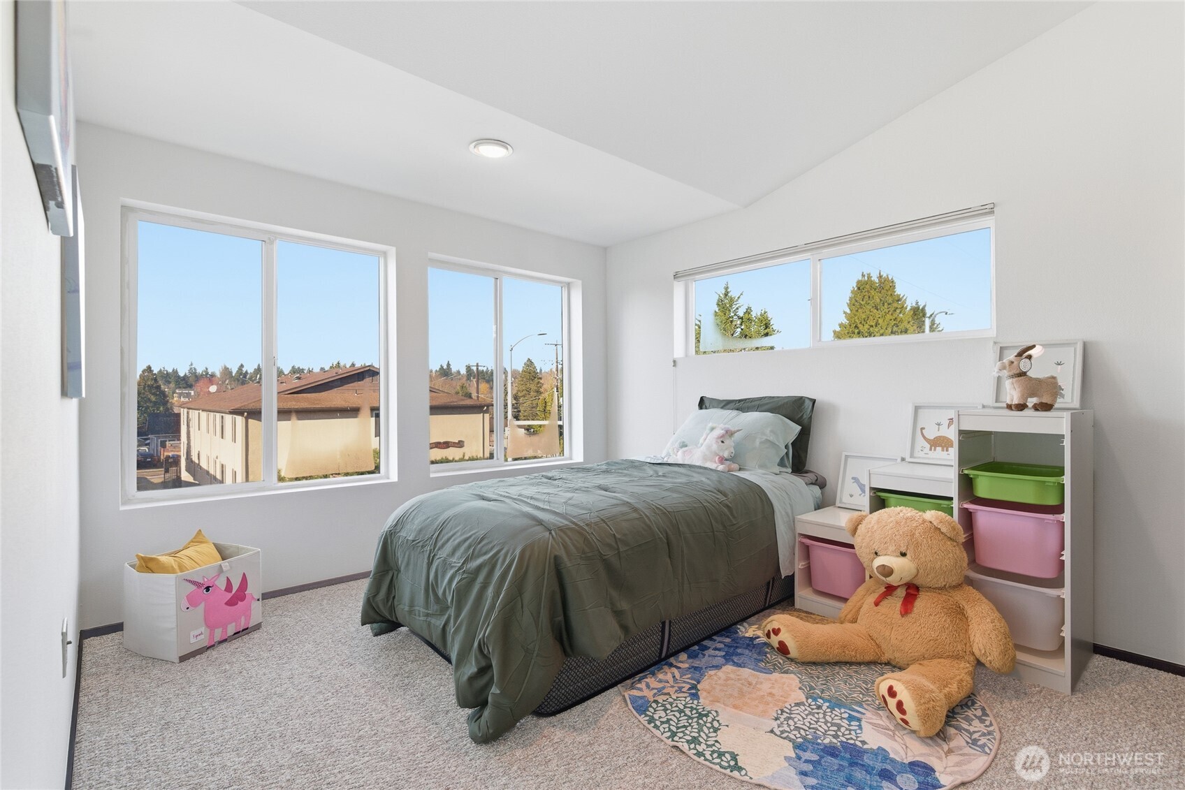 8408 Delridge Way Southwest, Unit A Seattle, WA 98106 - Photo 16 of 22 a bedroom with a bed and wooden floor
