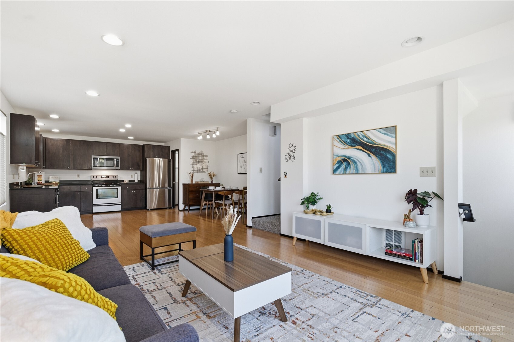 8408 Delridge Way Southwest, Unit A Seattle, WA 98106 - Photo 2 of 22 a living room with furniture and kitchen view