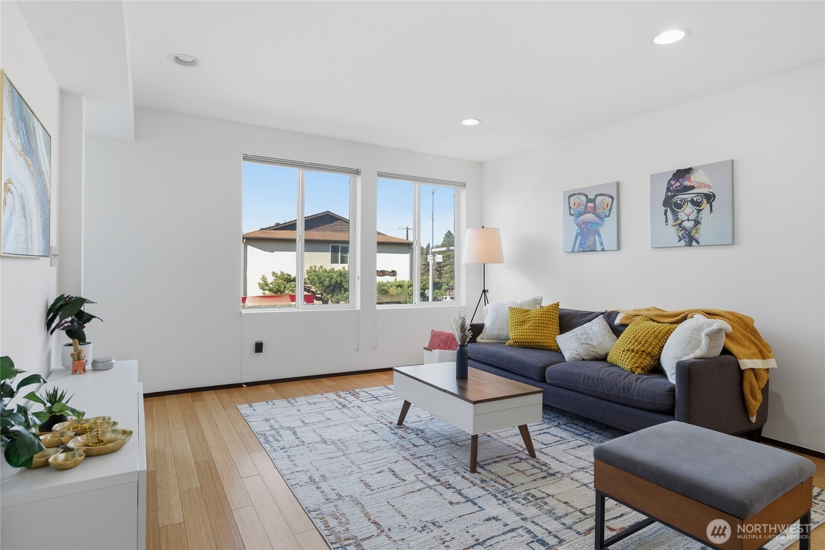 8408 Delridge Way Southwest, Unit A Seattle, WA 98106 - Photo 3 of 22 a living room with furniture and a potted plant