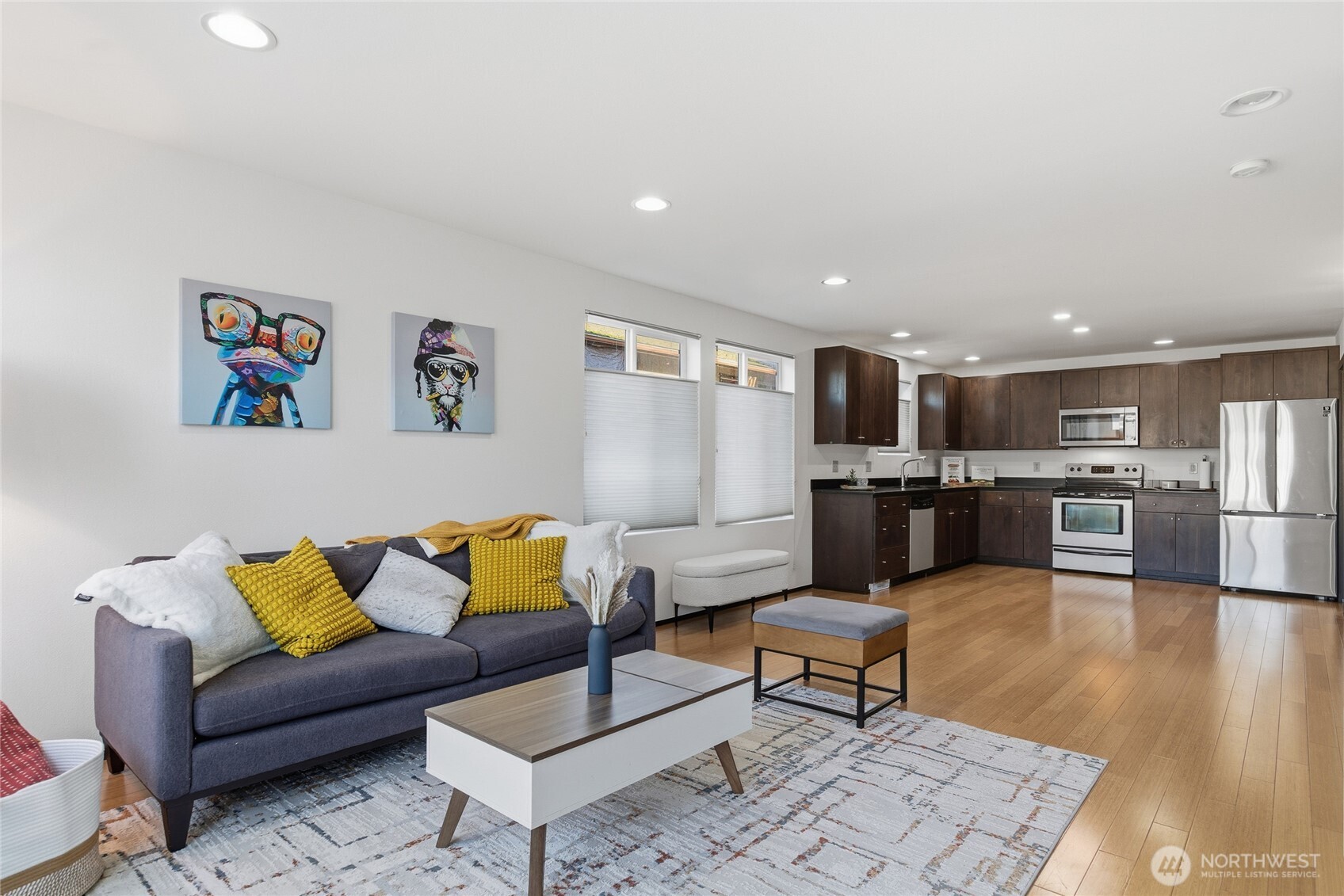 8408 Delridge Way Southwest, Unit A Seattle, WA 98106 - Photo 5 of 22 a living room with furniture and kitchen view