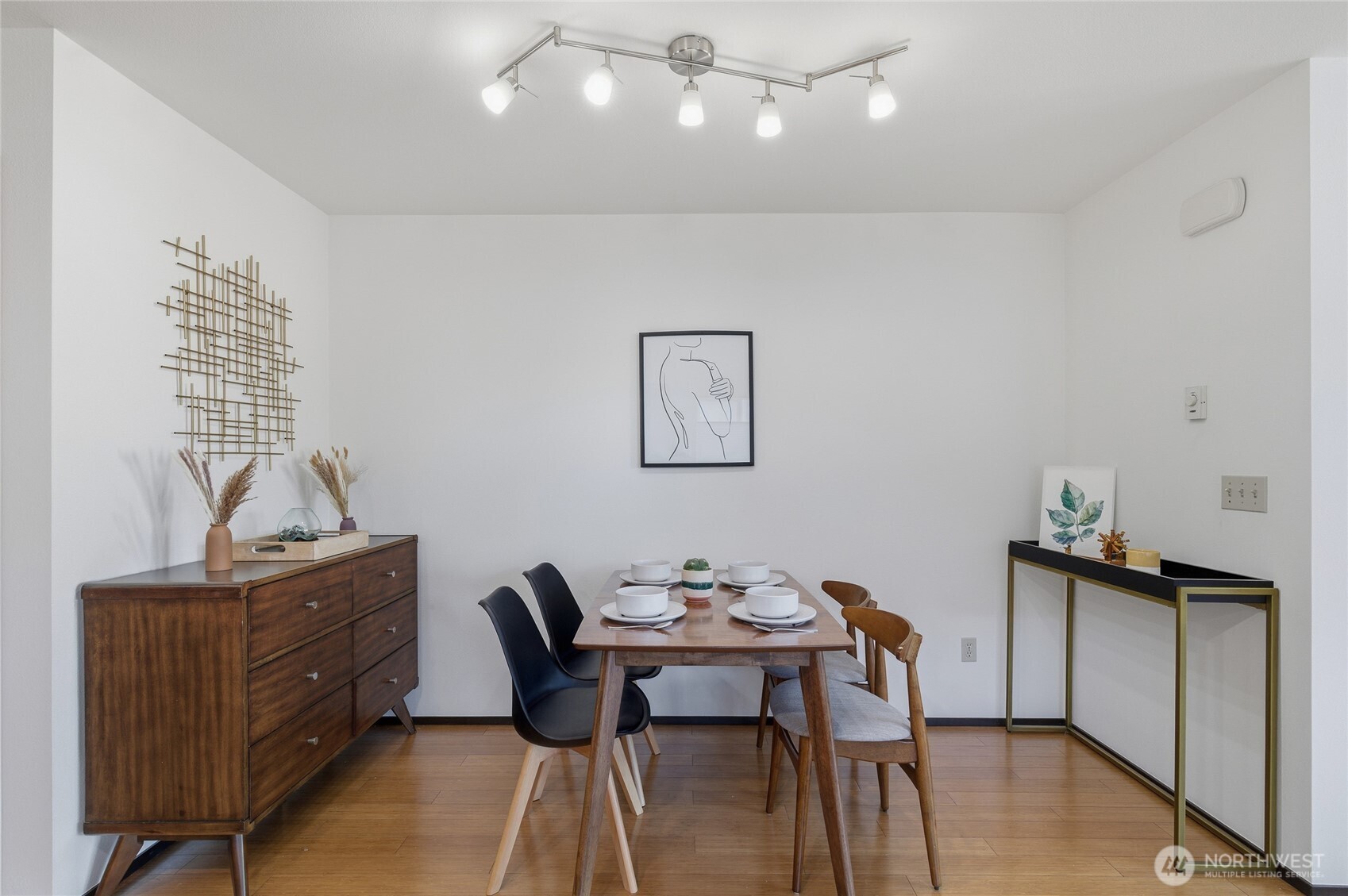 8408 Delridge Way Southwest, Unit A Seattle, WA 98106 - Photo 9 of 22 a view of a workspace with furniture and wooden floor