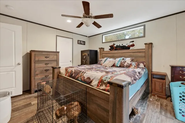 a bedroom with a bed and a table in it