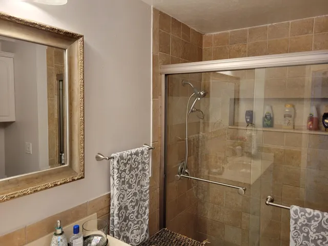 a view of a room with racks on the wall