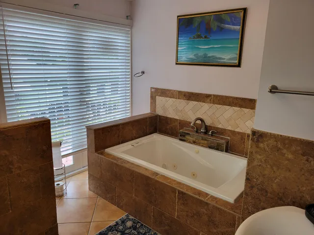 a bathroom with a sink and a bathtub