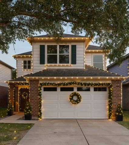 a front view of a house with barbeque area