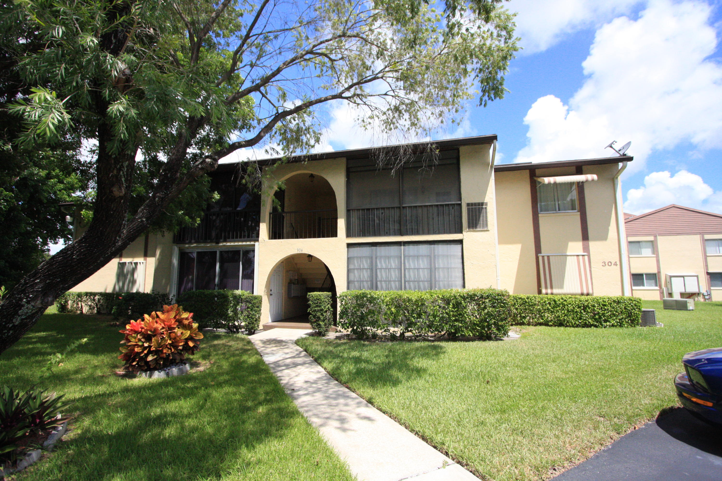 304 Pine Ridge Circle, Unit D2 Greenacres, FL 33463 - Photo 1 of 49 Front