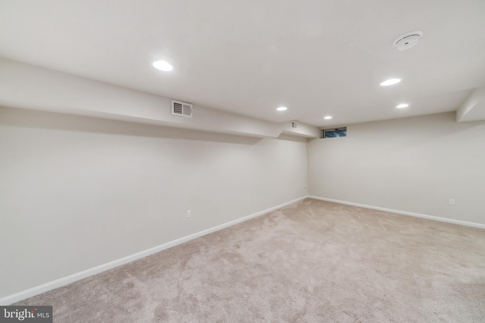 107 Ridge Avenue Taneytown, MD 21787 - Photo 27 of 34 Lower level recreation room