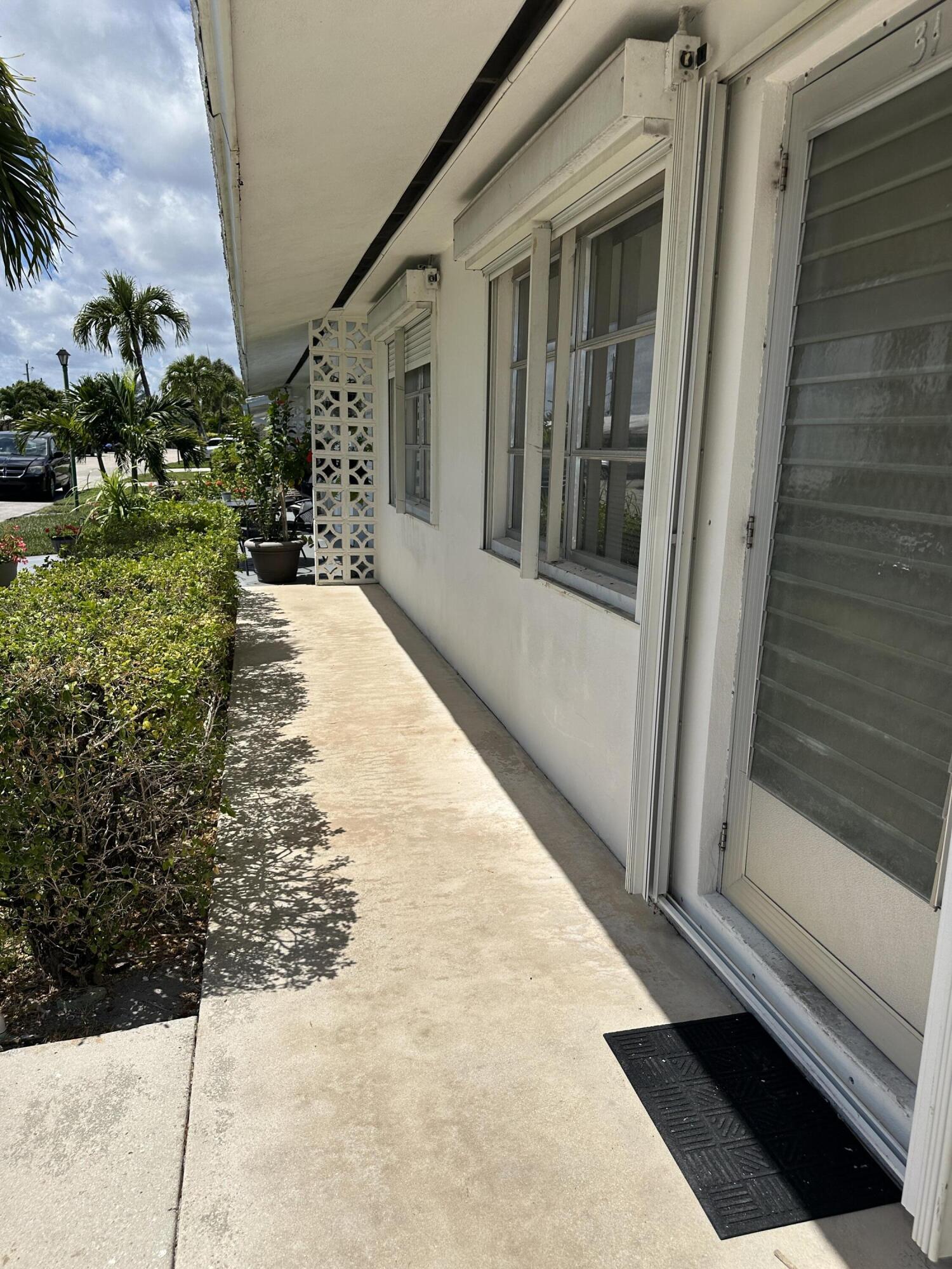 728 Ridge Road, Unit 31 Lantana, FL 33462 - Photo 2 of 24 Front patio