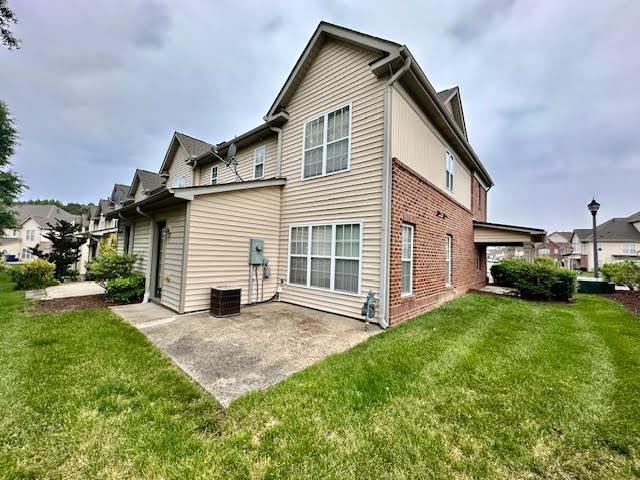 9801 Blackwell Drive Raleigh, NC 27617 - Photo 23 of 23 a view of a house with a yard and pathway