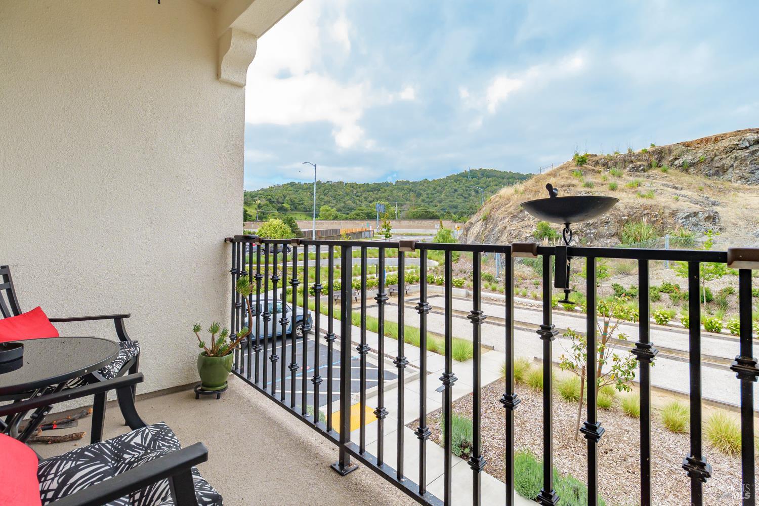 715 Rockview Road Novato, CA 94949 - Photo 5 of 35 Relaxing 2nd level balcony off kitchen and dining area with views of bocce ball courts, park, picnic area, gardens and Mt Burdell.