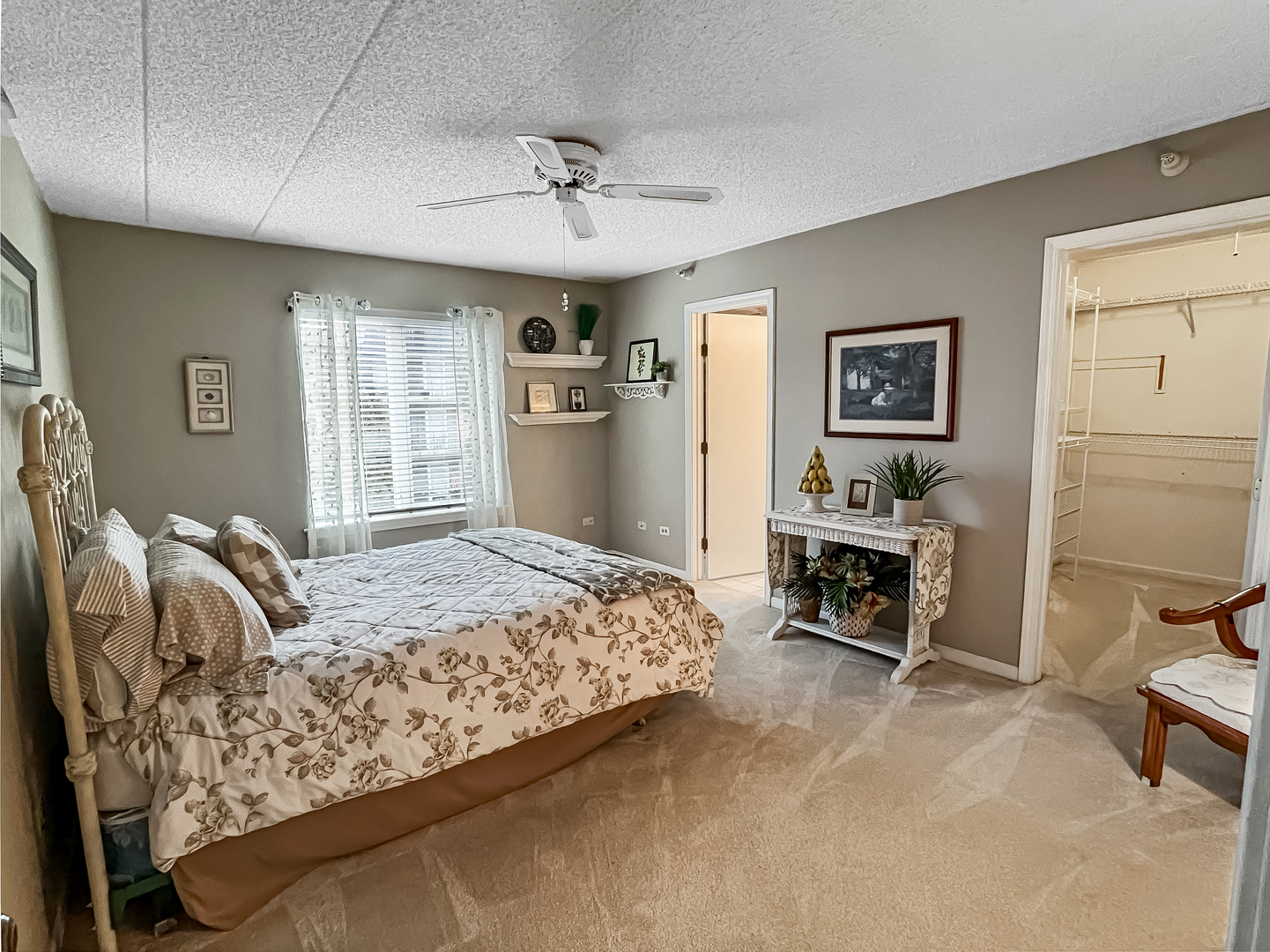 3640 186th Street, Unit 201 Lansing, IL 60438 - Photo 11 of 21 a bedroom with a bed wooden floor and furniture