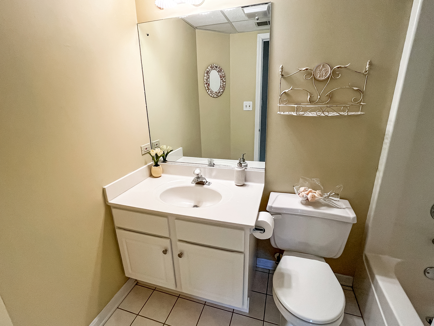 3640 186th Street, Unit 201 Lansing, IL 60438 - Photo 17 of 21 a bathroom with a toilet sink and mirror