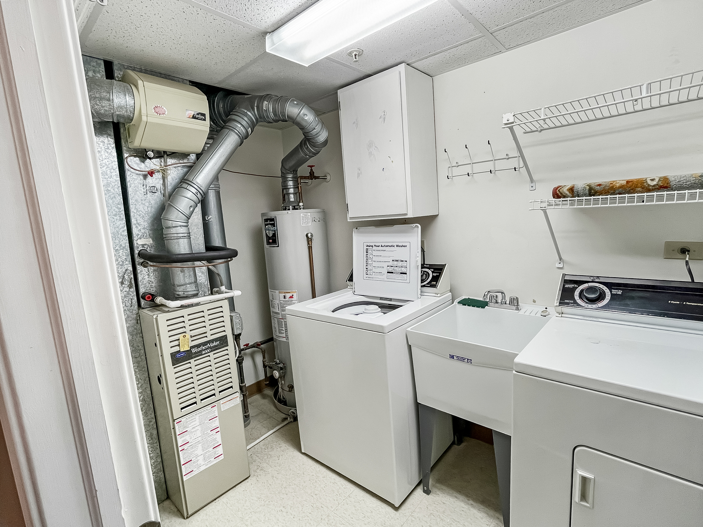 3640 186th Street, Unit 201 Lansing, IL 60438 - Photo 19 of 21 a utility room with dryer and washer