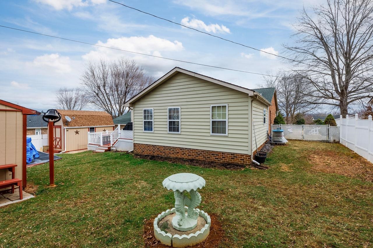 58 Rolla Mill Road Verona, VA 24482 - Photo 12 of 46 a view of a house with a yard and a large tree