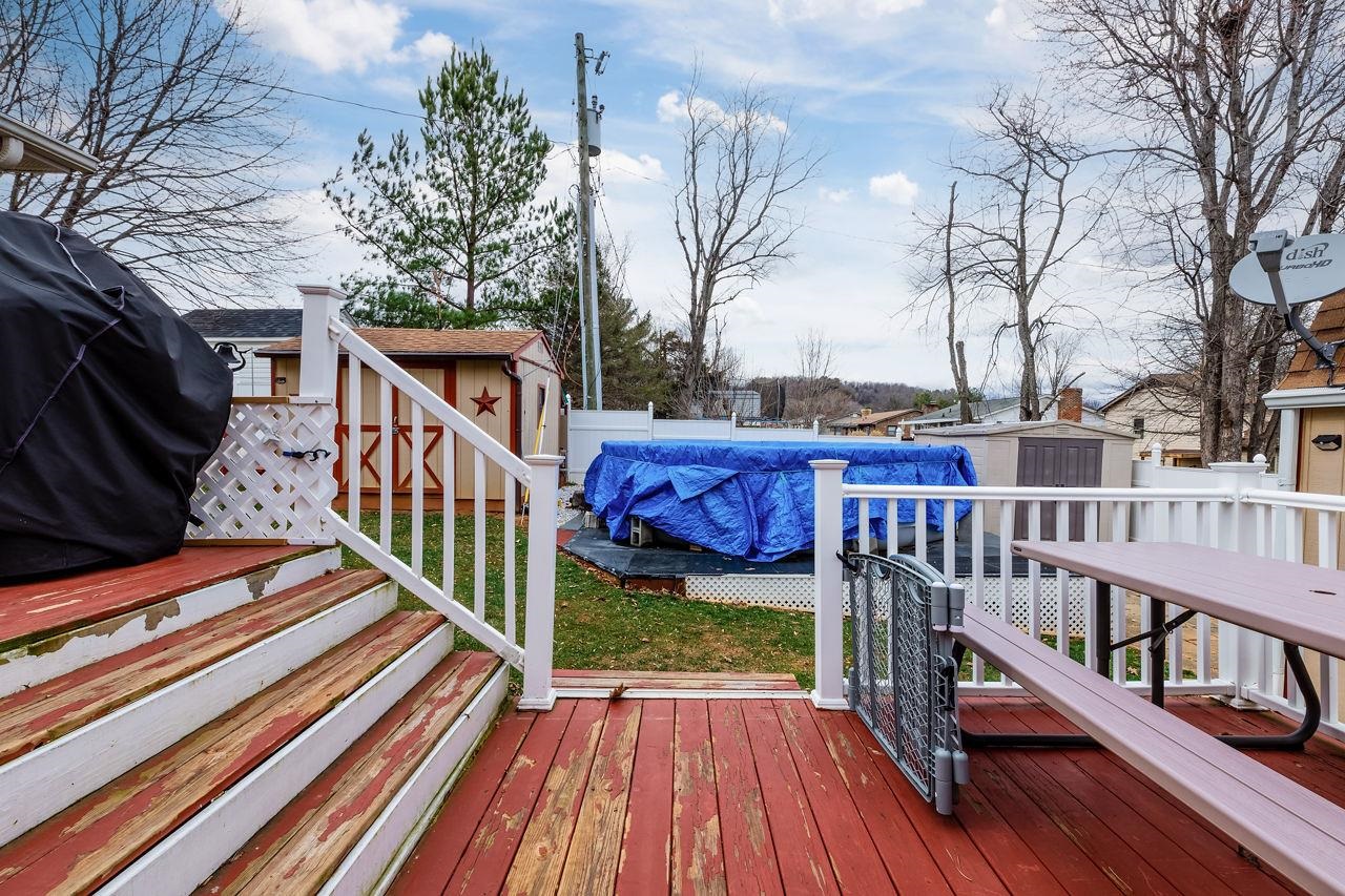 58 Rolla Mill Road Verona, VA 24482 - Photo 15 of 46 a view of a house with backyard and wooden deck