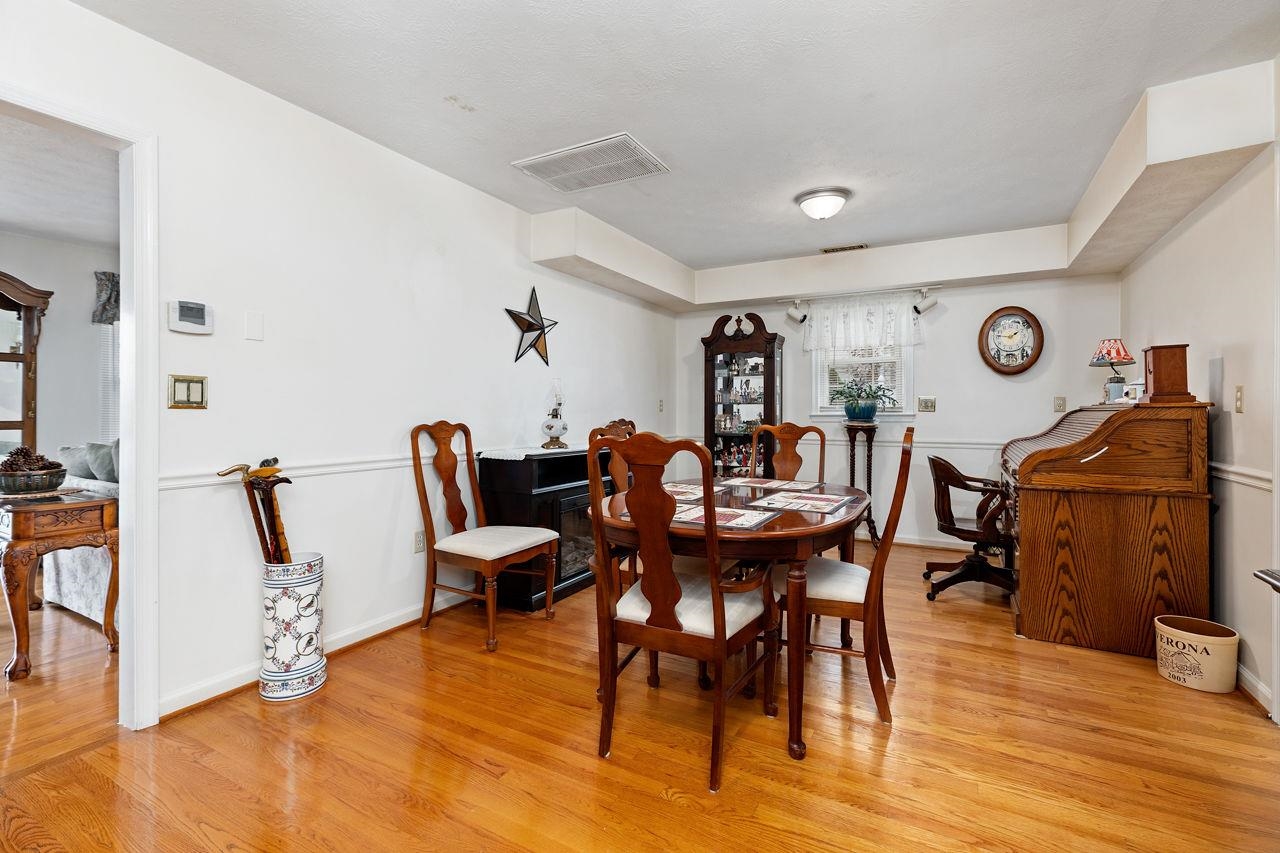 58 Rolla Mill Road Verona, VA 24482 - Photo 25 of 46 a view of a dining room with furniture and wooden floor