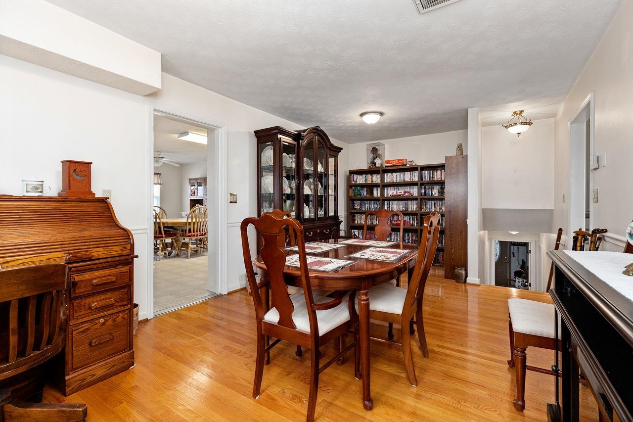 58 Rolla Mill Road Verona, VA 24482 - Photo 26 of 46 a view of a dining room with furniture