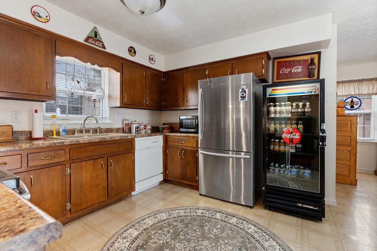 58 Rolla Mill Road Verona, VA 24482 - Photo 29 of 46 a kitchen with stainless steel appliances granite countertop a refrigerator and a stove top oven